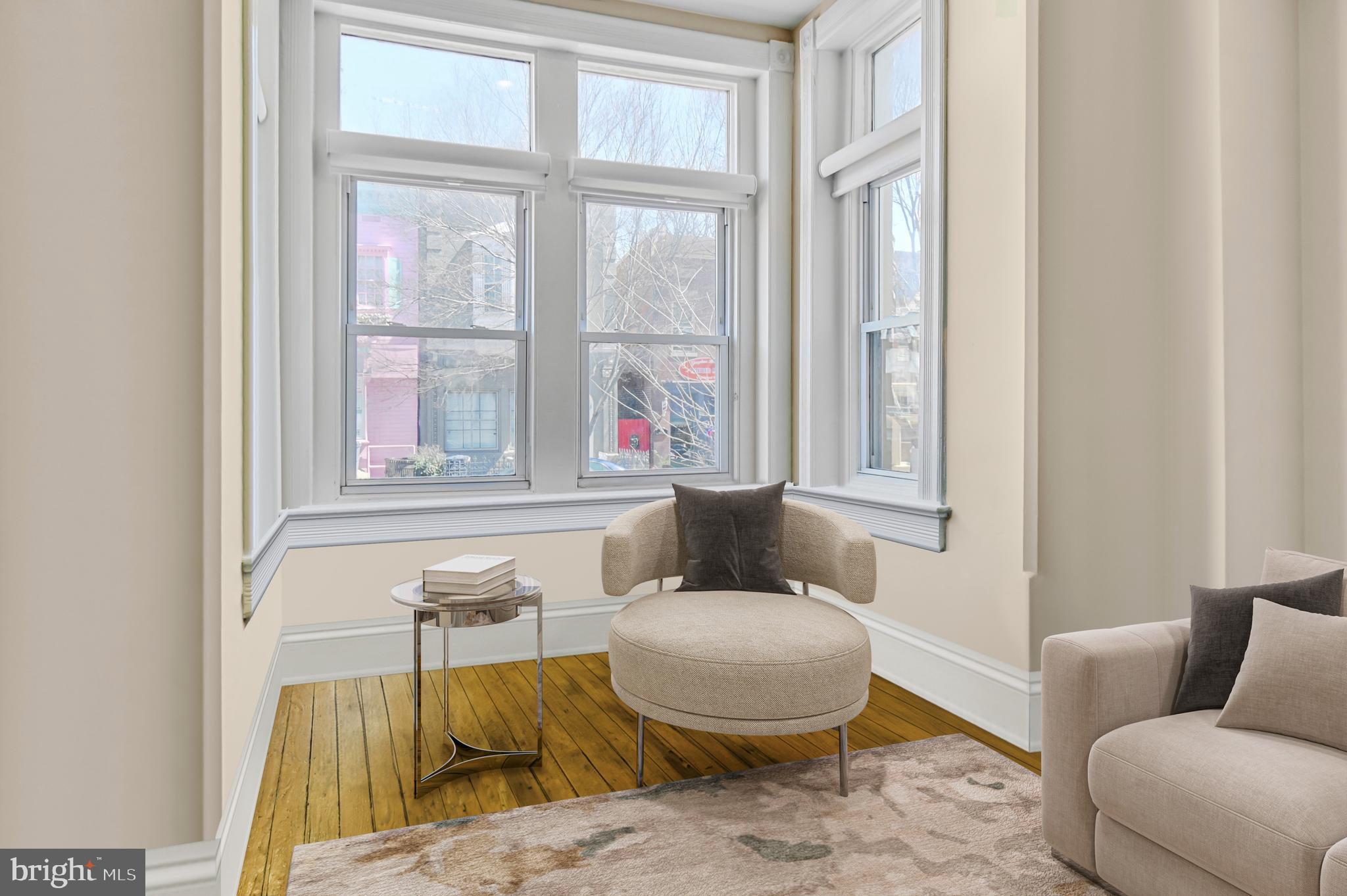 1330 35th Street Northwest Washington, DC 20007 - Photo 5 of 30 a living room with furniture and a window