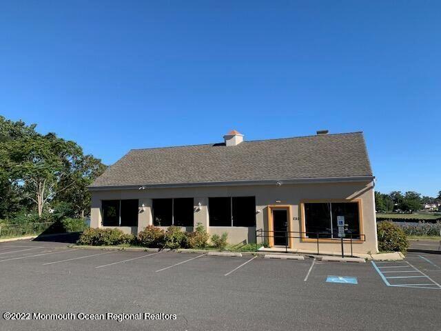 Liberty Street Long Branch, NJ 07740 - Photo 10 of 15 a front view of a house with glass windows and a table and chairs
