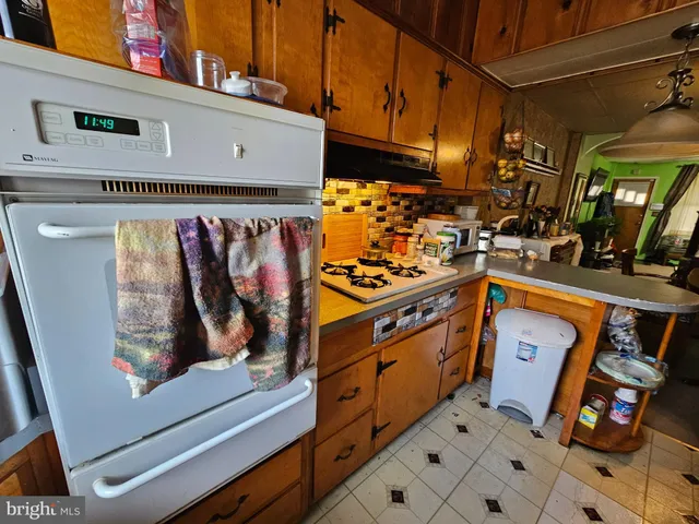 a view of an chairs in the kitchen