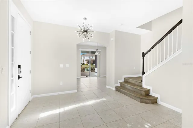 a kitchen with a sink stove and refrigerator