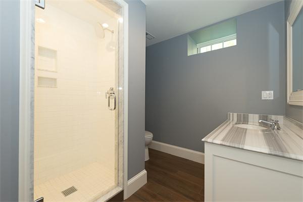 14 Winthrop Road Lexington, MA 02421 - Photo 27 of 30 a utility room with wooden floor washer and dryer