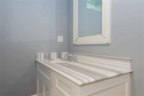 14 Winthrop Road Lexington, MA 02421 - Photo 28 of 30 a bathroom with a sink and a mirror