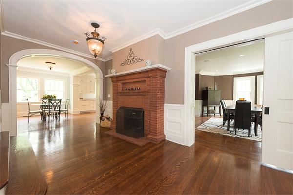 14 Winthrop Road Lexington, MA 02421 - Photo 3 of 30 a view of a livingroom with furniture fireplace and wooden floor