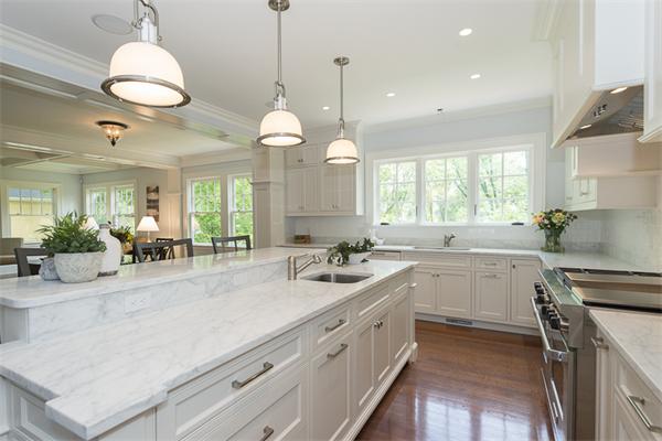 14 Winthrop Road Lexington, MA 02421 - Photo 10 of 30 a kitchen with a sink stove and cabinets
