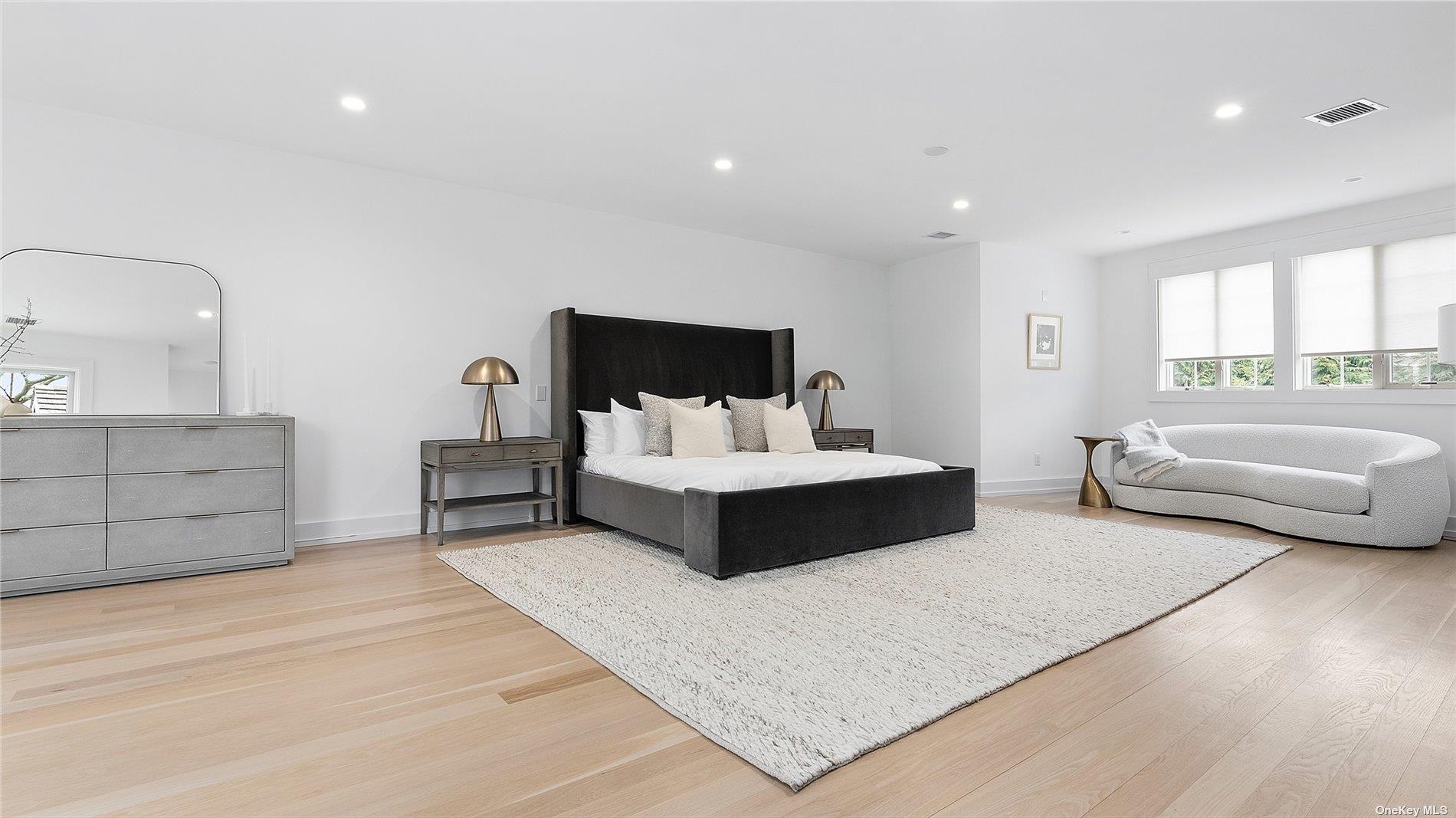 81 Skimhampton Road East Hampton, NY 11937 - Photo 12 of 24 a bedroom with furniture and window