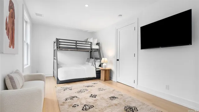 a living room with a couch and a flat screen tv