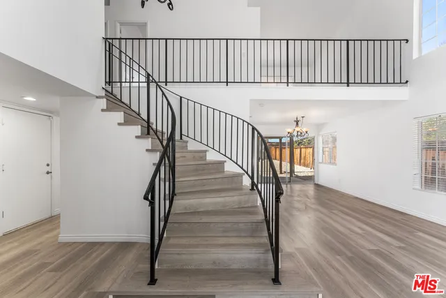 a view of entryway with wooden floor