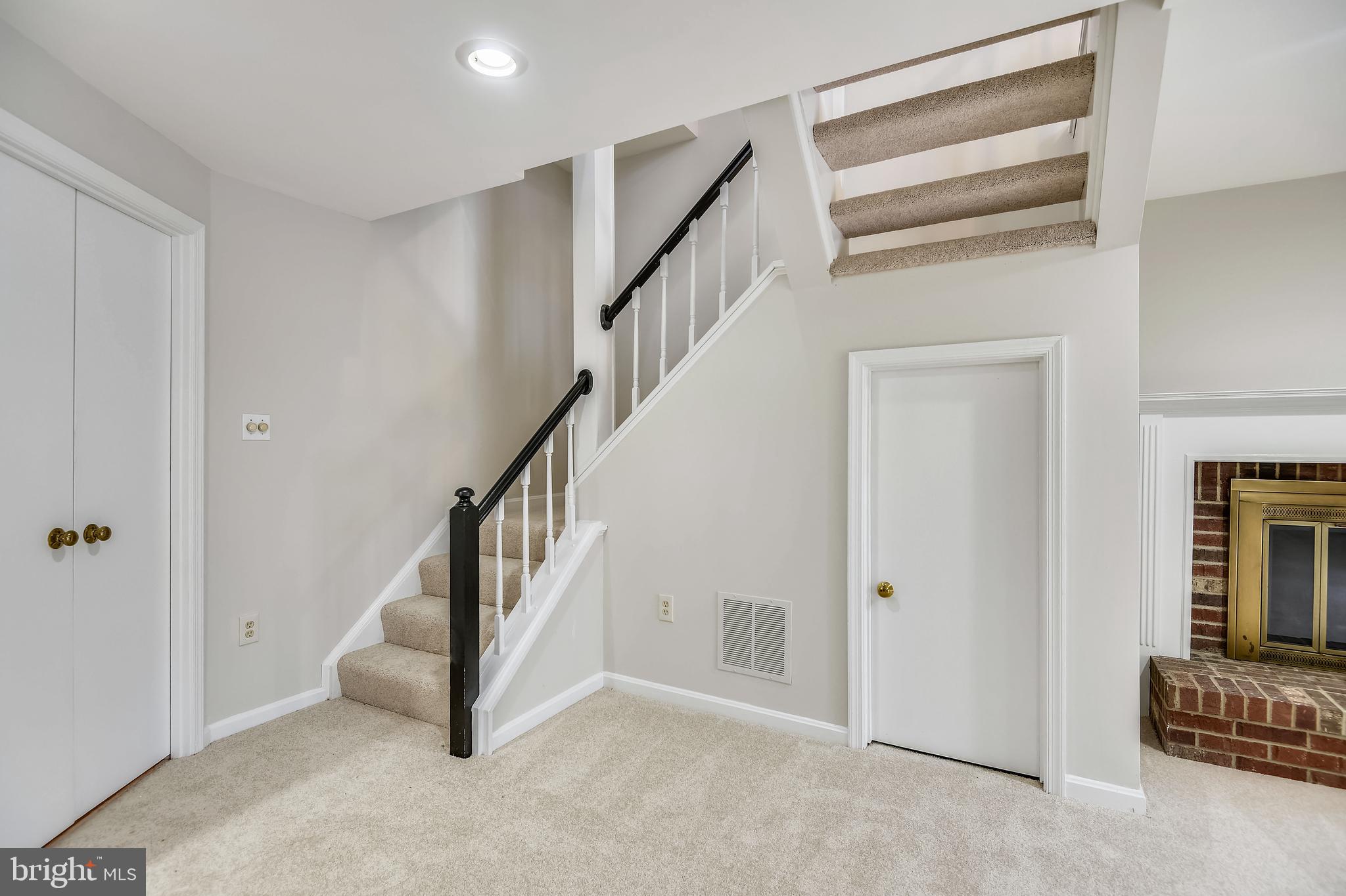 11942 Sentinel Point Court Reston, VA 20191 - Photo 24 of 42 Stairway to the Lower Level Rec Room