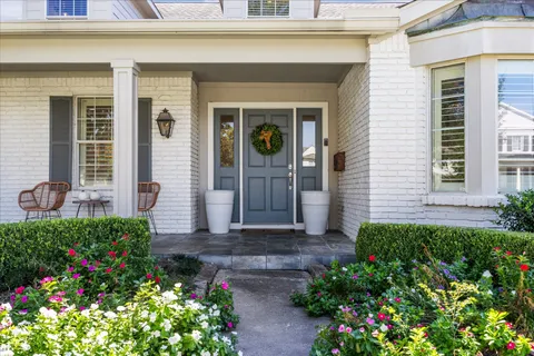 a view of a pathway besides a house