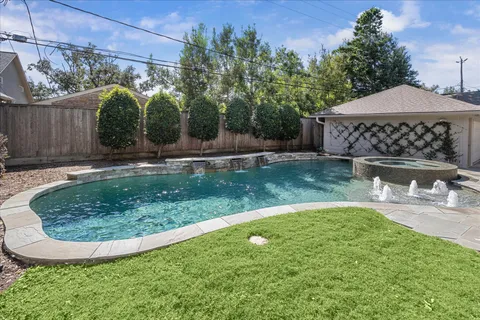 a view of a backyard with a garden