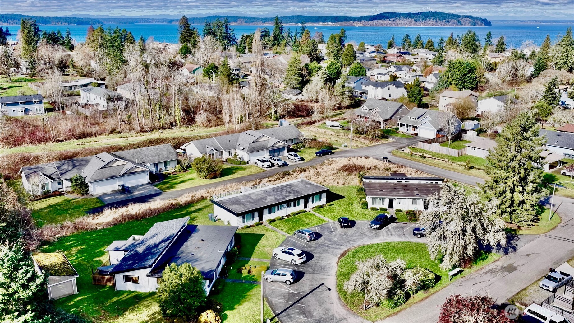 an aerial view of a house with a garden