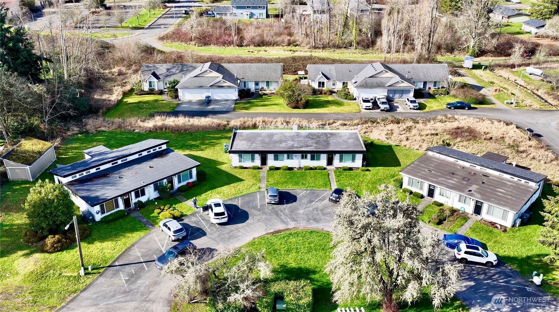 814 5th Street Steilacoom, WA 98388 - Photo 4 of 21 an aerial view of a house with garden space and street view