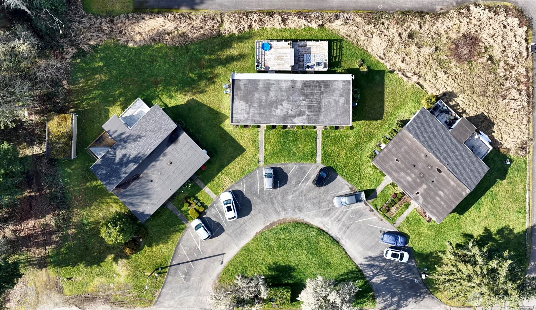 814 5th Street Steilacoom, WA 98388 - Photo 5 of 21 an aerial view of a house with yard swimming pool and outdoor seating
