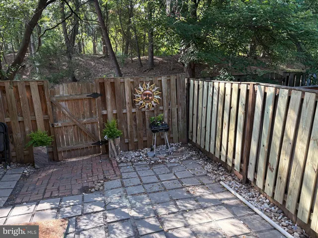 a view of a backyard with green space