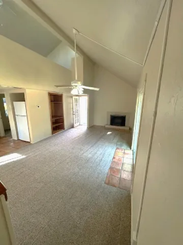 an empty room with staircase