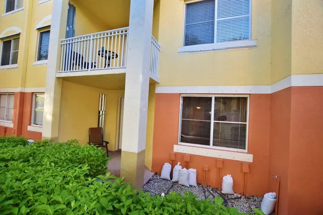 a front view of a house having yard