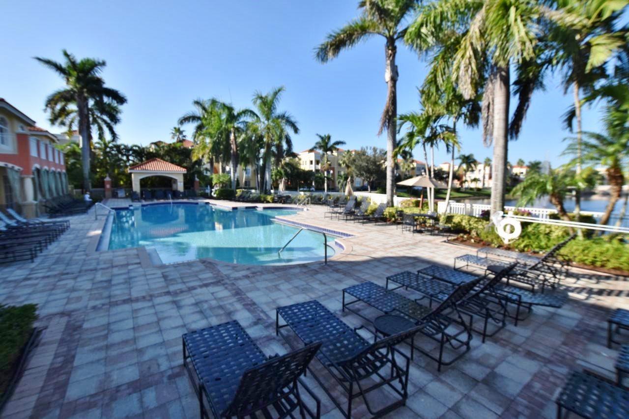 11016 Legacy Drive, Unit 103 Palm Beach Gardens, FL 33410 - Photo 29 of 44 a view of a yard with swimming pool