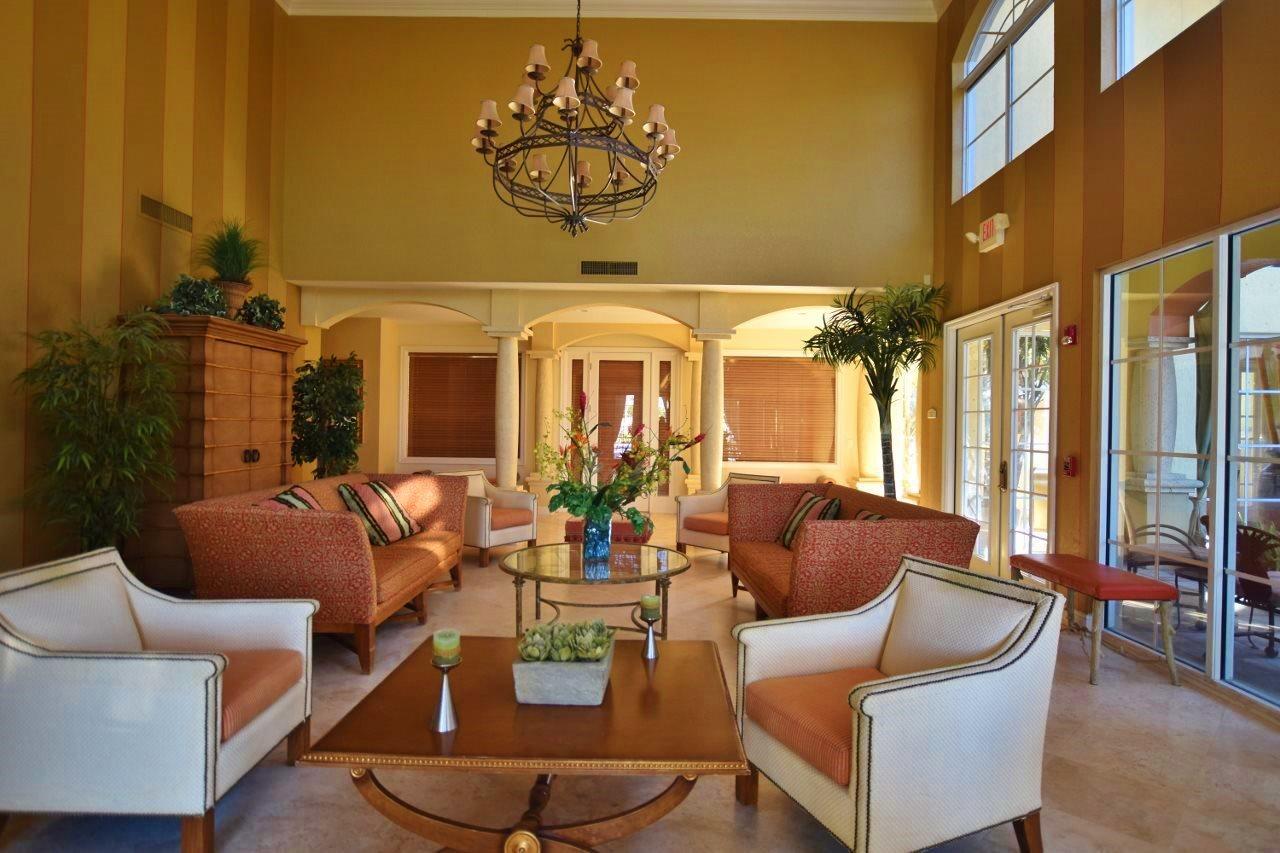 11016 Legacy Drive, Unit 103 Palm Beach Gardens, FL 33410 - Photo 3 of 44 a outdoor living space with furniture