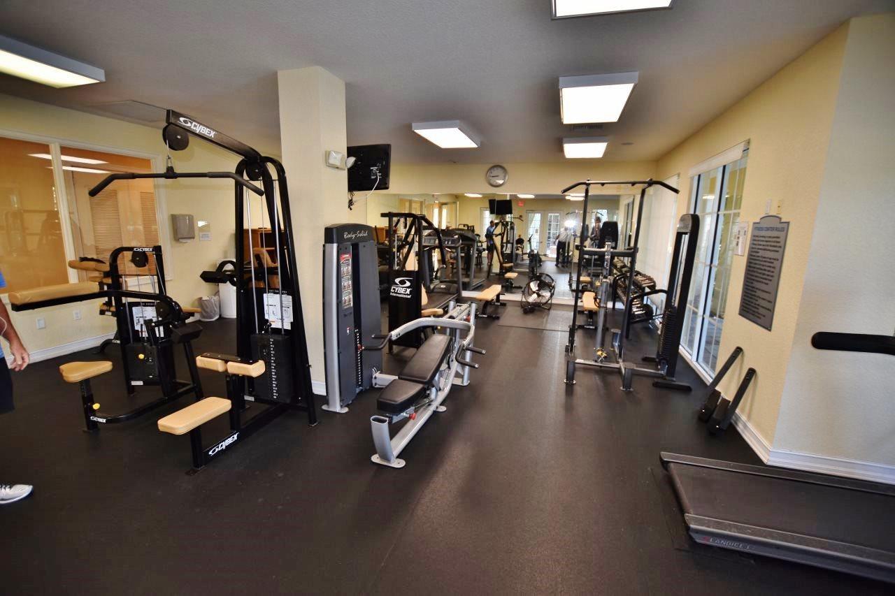11016 Legacy Drive, Unit 103 Palm Beach Gardens, FL 33410 - Photo 37 of 44 a view of a room with gym equipment