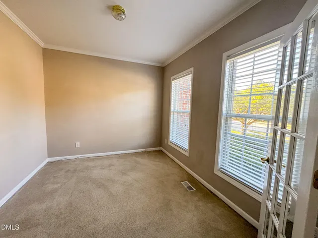 an empty room with windows