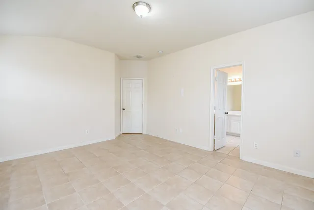 an empty room with an entryway