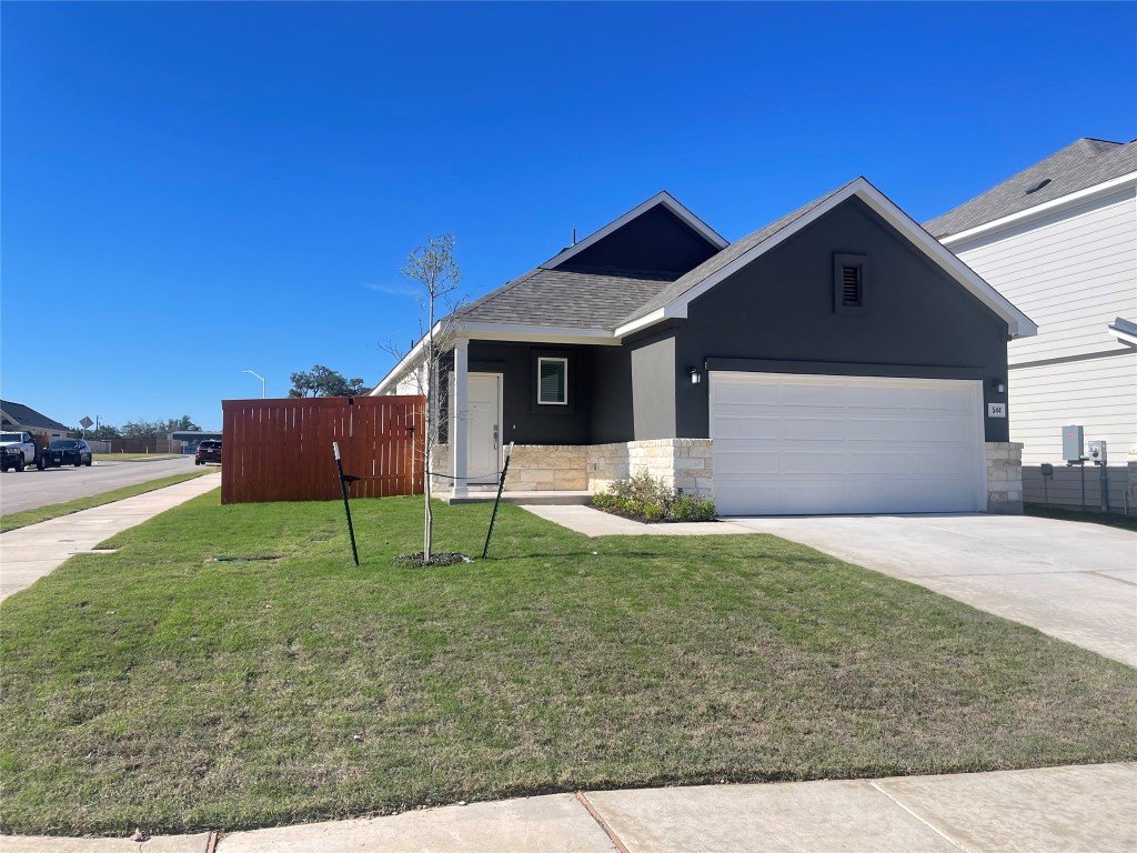 a house view with a garden space