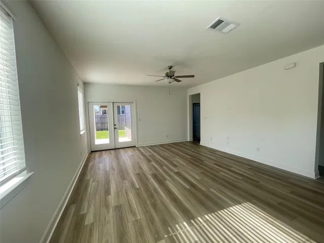 a kitchen with a sink and a refrigerator