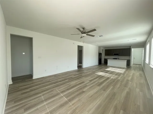 a view of an empty room and window