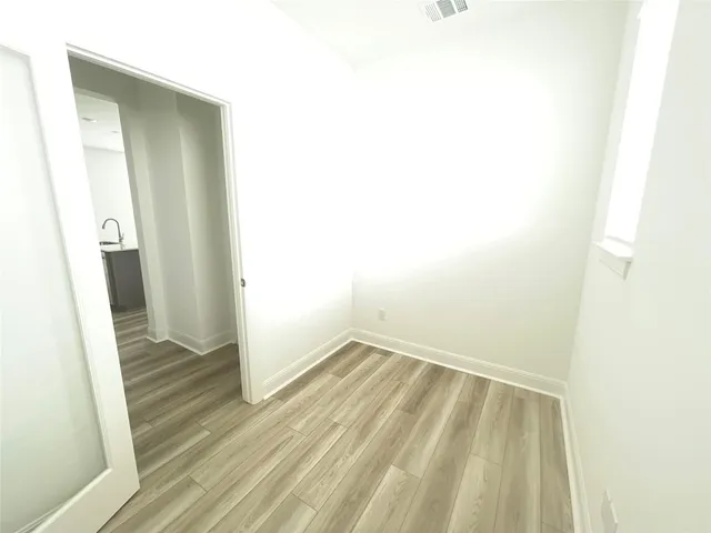 a view of kitchen with windows