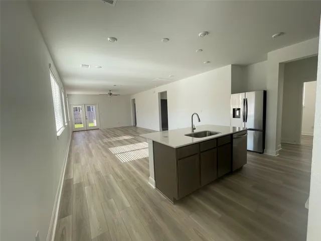 an aerial view of a house with outdoor space