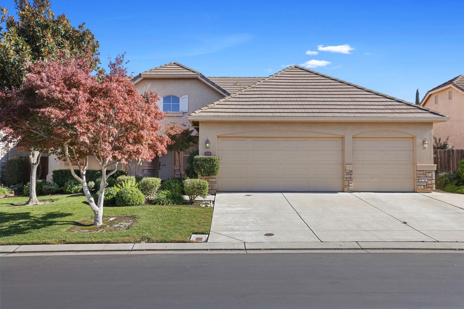 4316 Versailles Drive Modesto, CA 95356 - Photo 2 of 45 front view of a house