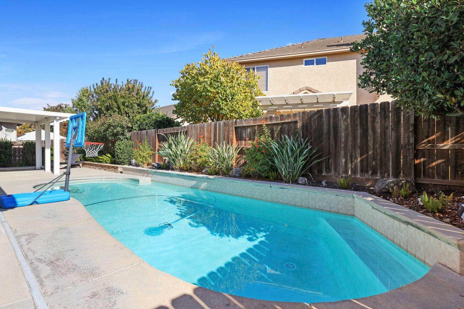 4316 Versailles Drive Modesto, CA 95356 - Photo 43 of 45 a view of a backyard