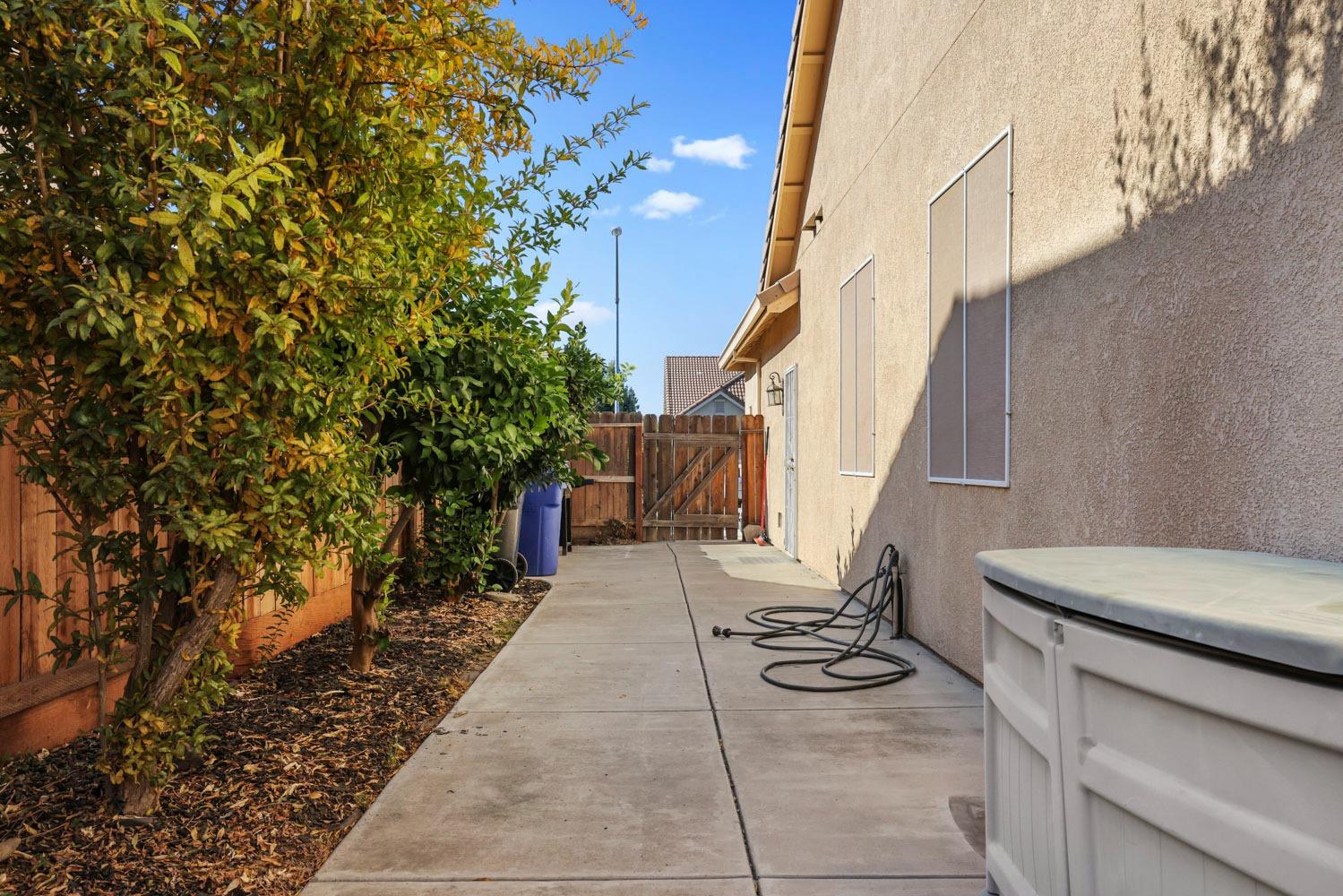 4316 Versailles Drive Modesto, CA 95356 - Photo 45 of 45 a path view of a house with garden