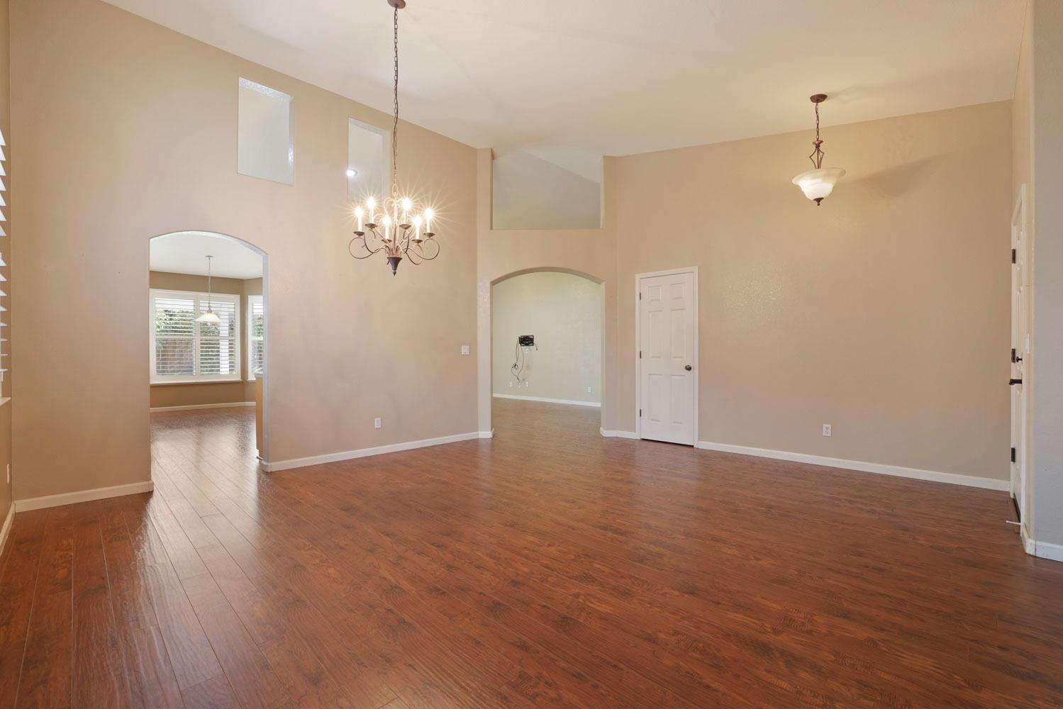 4316 Versailles Drive Modesto, CA 95356 - Photo 8 of 45 a view of a room with wooden floor