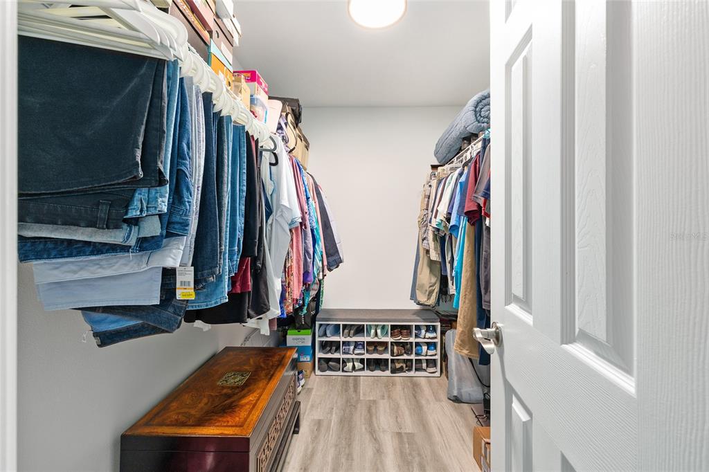 2844 Southwest 164th Street Road Ocala, FL 34473 - Photo 10 of 20 a view of walk in closet with clothes and shoes