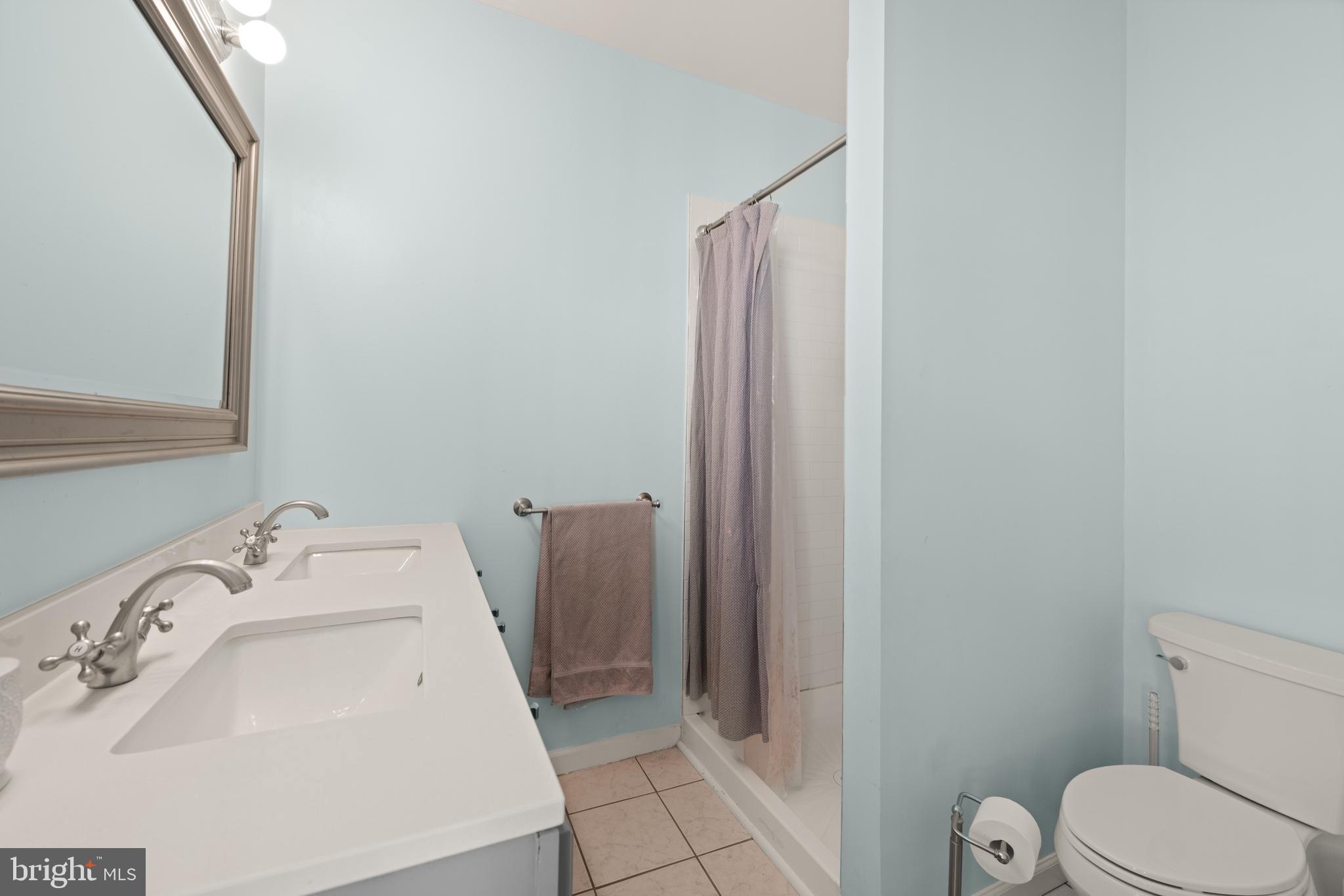 1919 6th Street Northwest Washington, DC 20001 - Photo 20 of 37 a bathroom with a sink and toilet