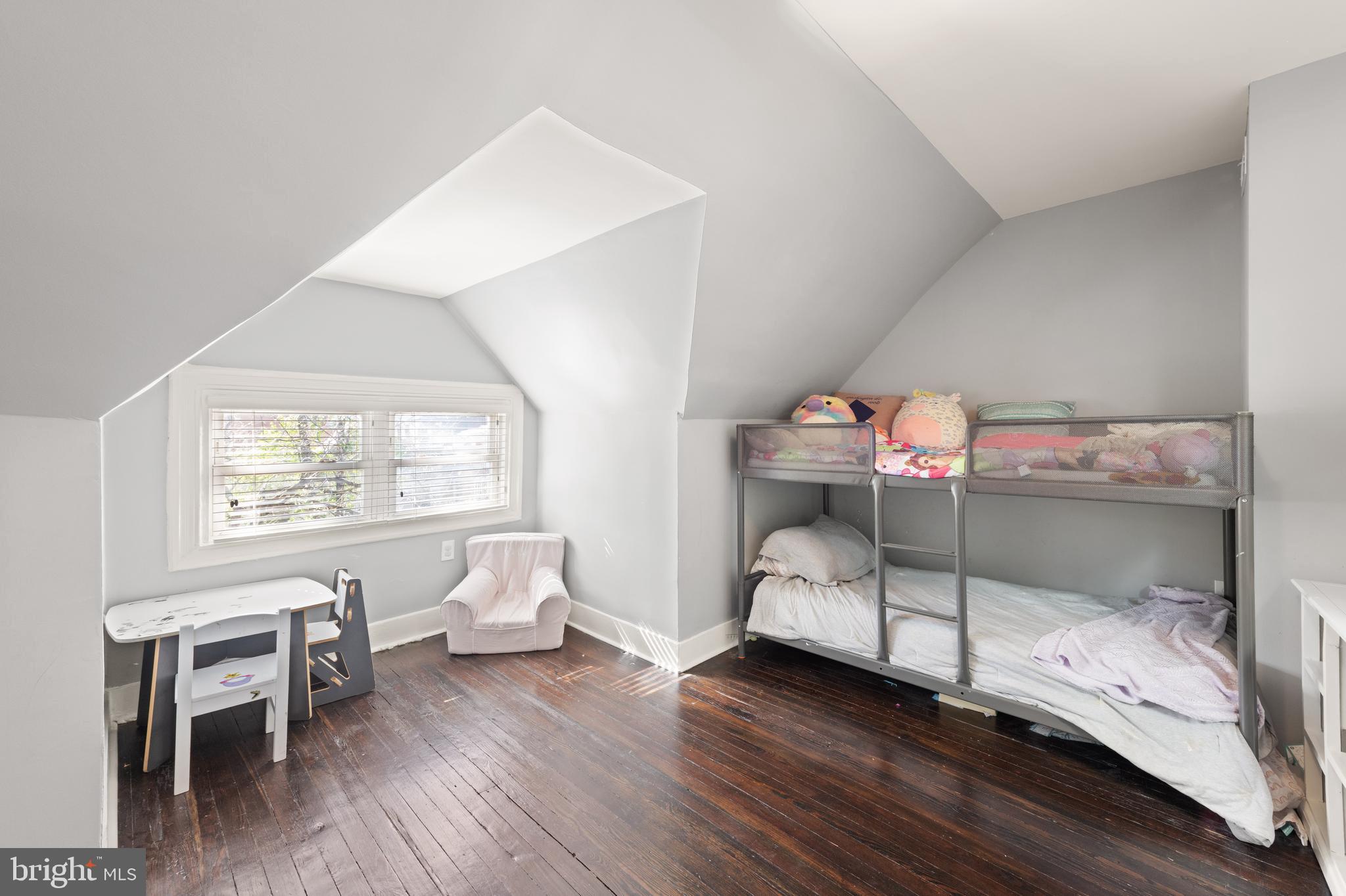 1919 6th Street Northwest Washington, DC 20001 - Photo 25 of 37 a bedroom with bunk beds and a chair