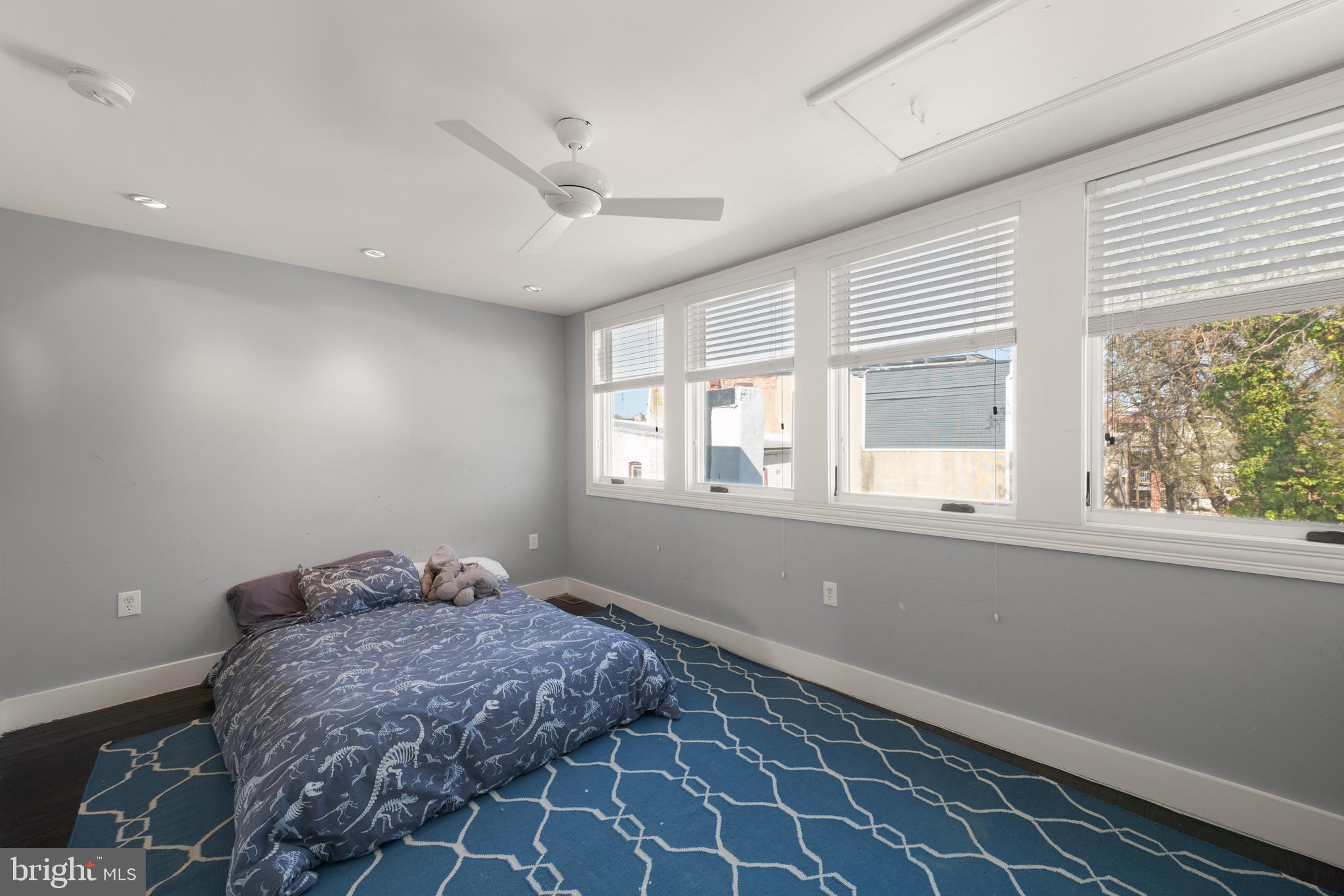 1919 6th Street Northwest Washington, DC 20001 - Photo 26 of 37 a bedroom with a bed and a window