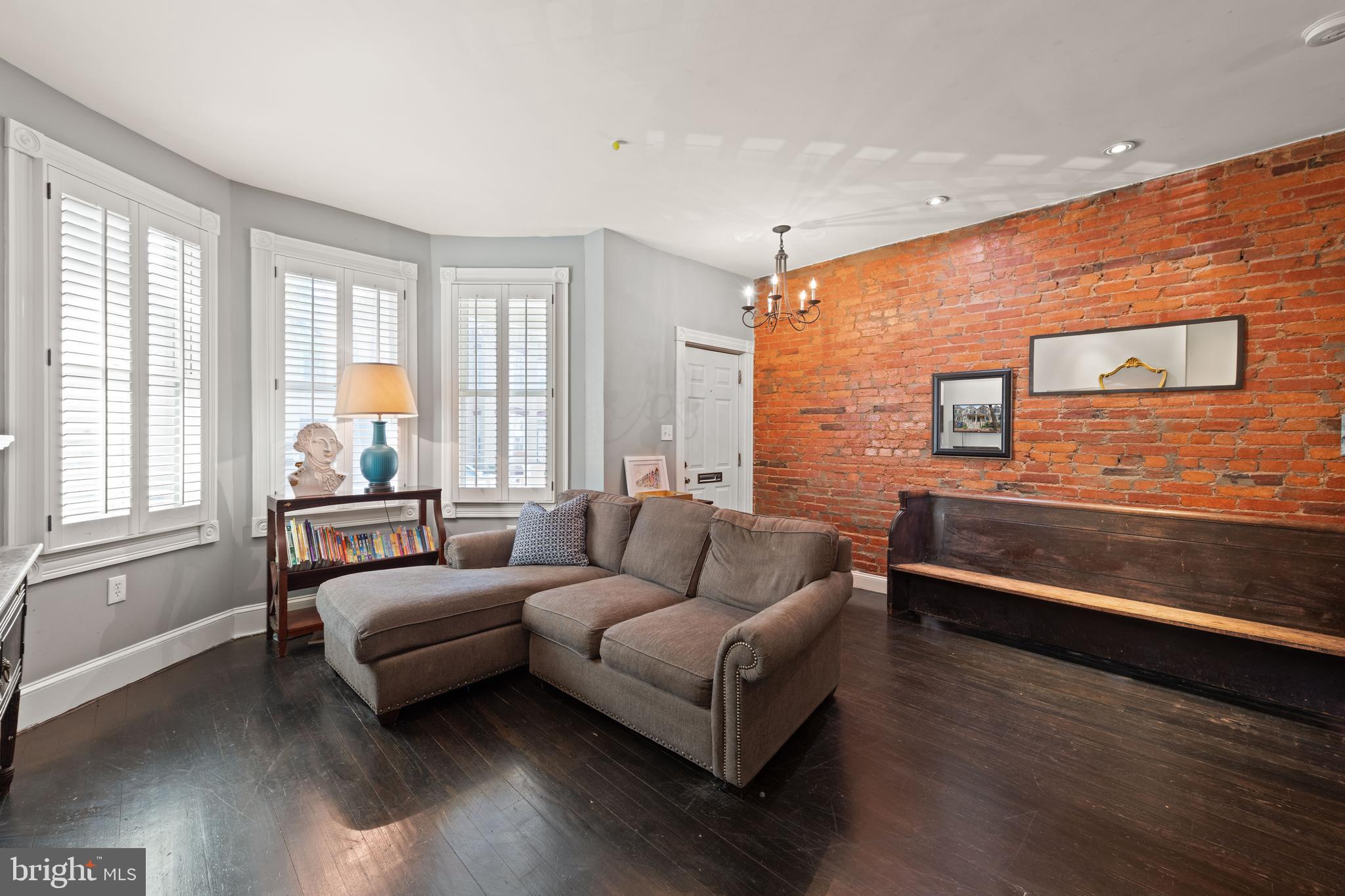 1919 6th Street Northwest Washington, DC 20001 - Photo 5 of 37 a living room with furniture and windows