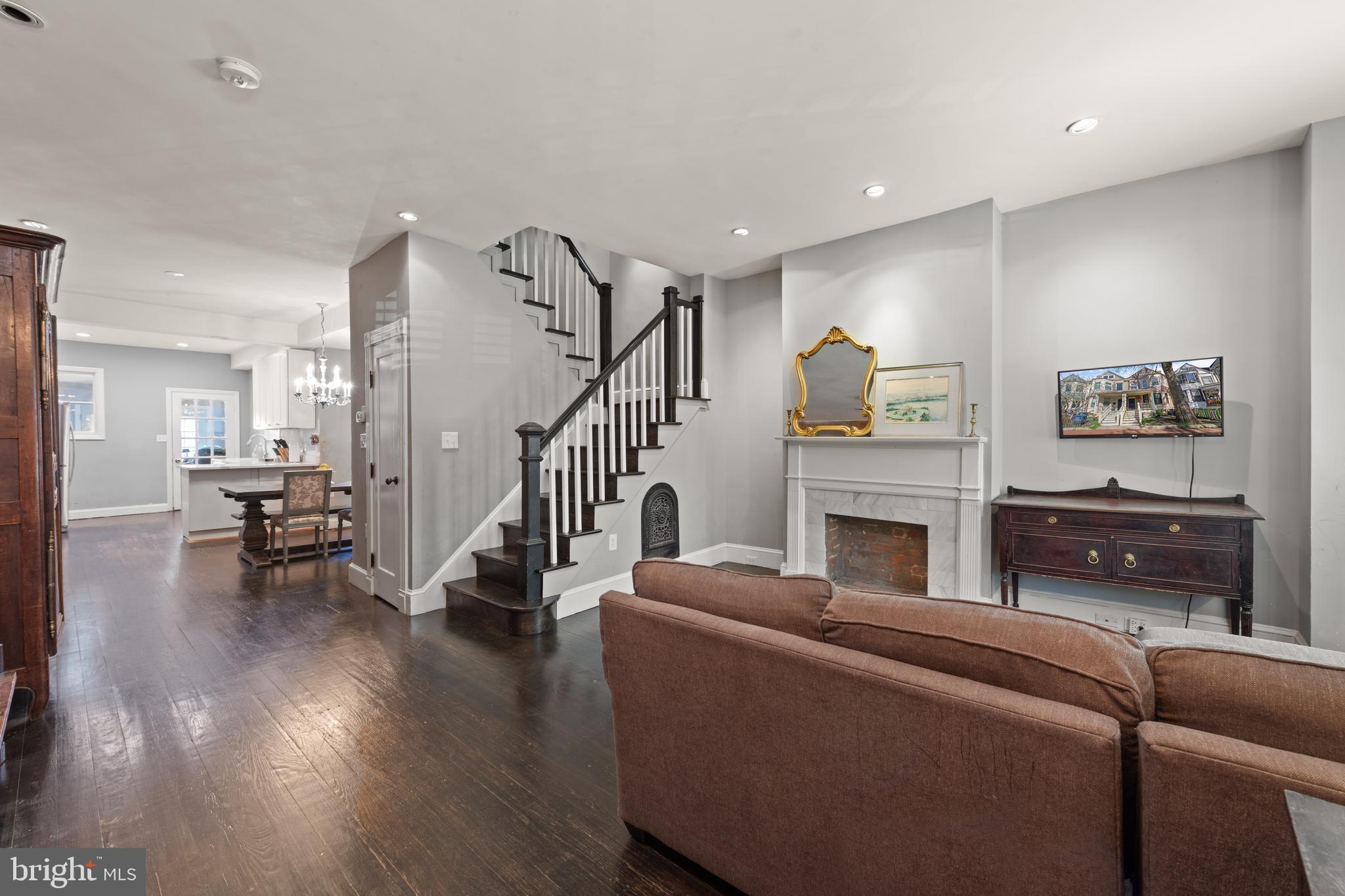 1919 6th Street Northwest Washington, DC 20001 - Photo 7 of 37 a living room with furniture and a fireplace