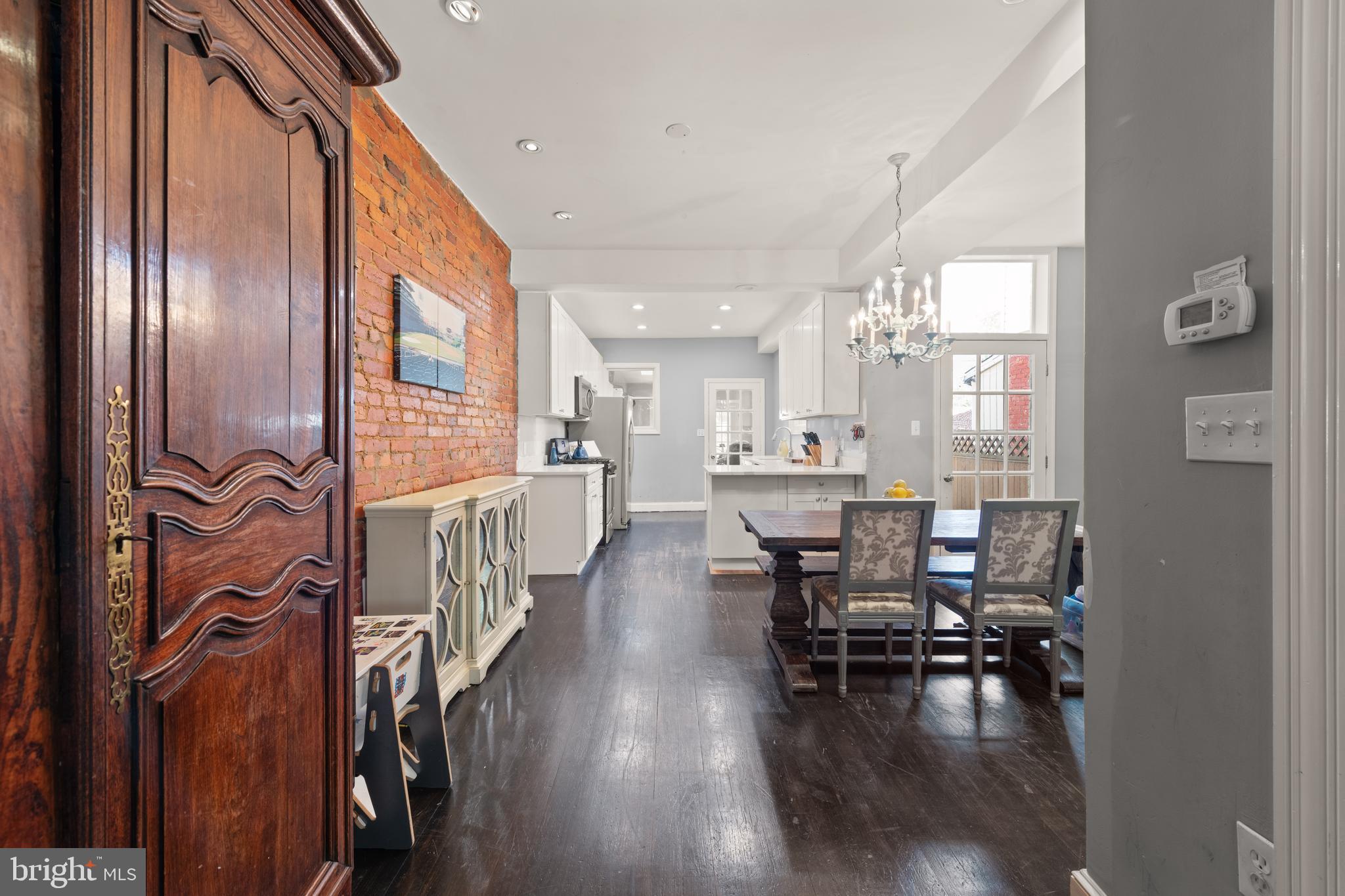 1919 6th Street Northwest Washington, DC 20001 - Photo 8 of 37 a view of a dining room with furniture window and wooden floor