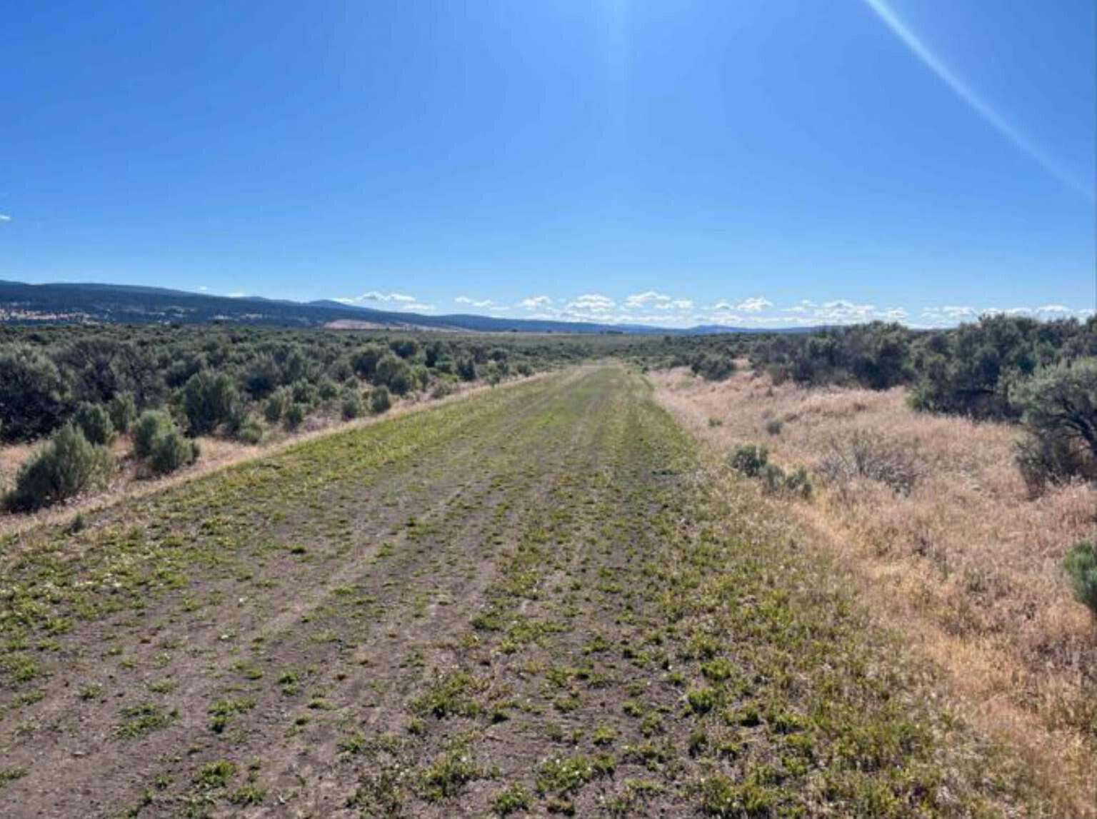 0 Cortez Road Alturas, CA 96101 - Photo 5 of 24 a view of a lake with a mountain
