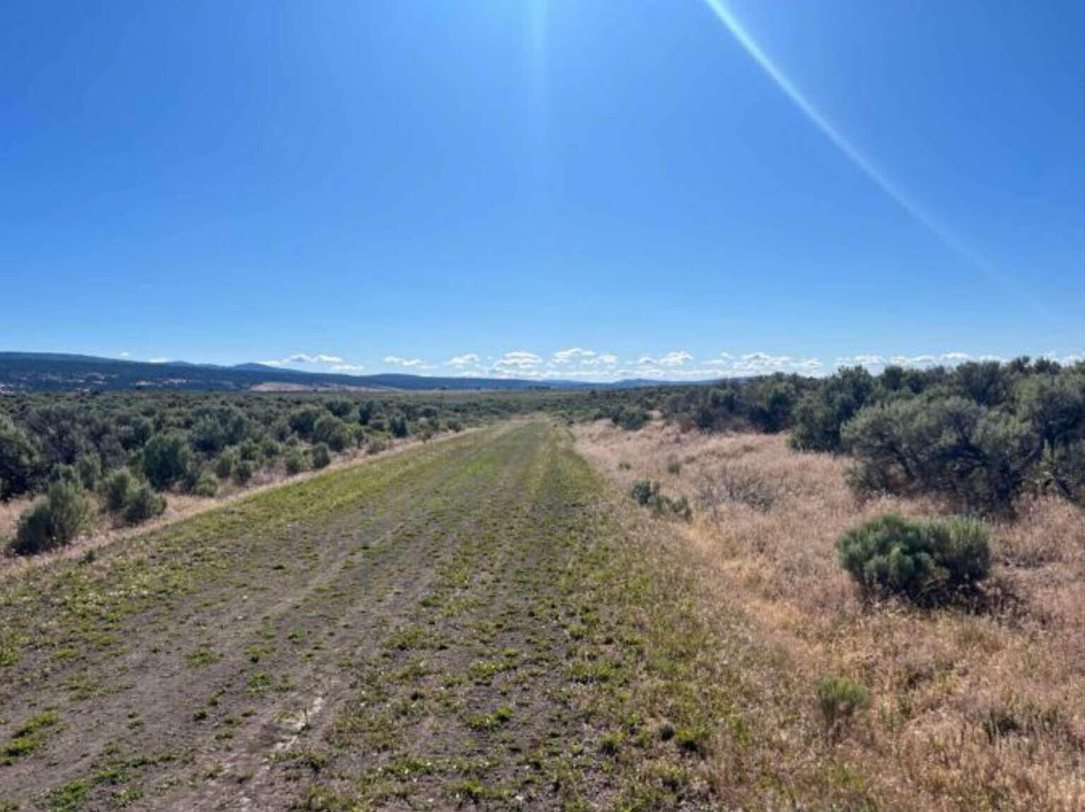 0 Cortez Road Alturas, CA 96101 - Photo 6 of 24 a view of a lake with mountain in the background