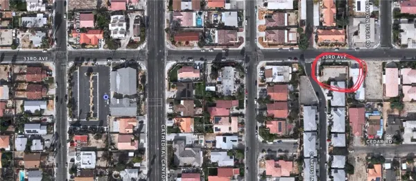 a view of a refrigerator with cabinets