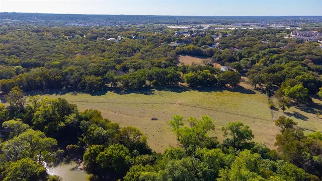 an aerial view of residential house with outdoor space