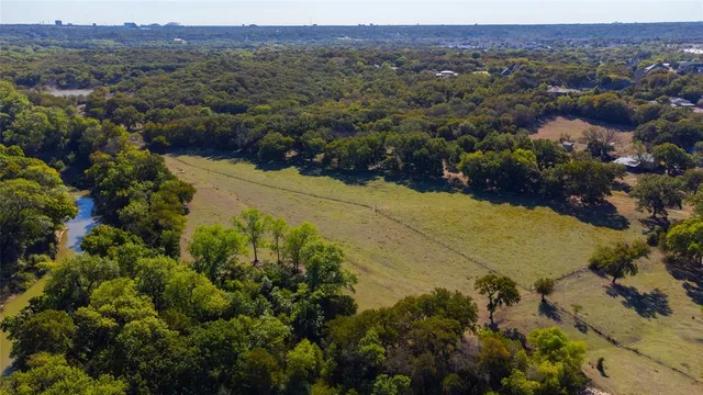 a view of a lake with beach