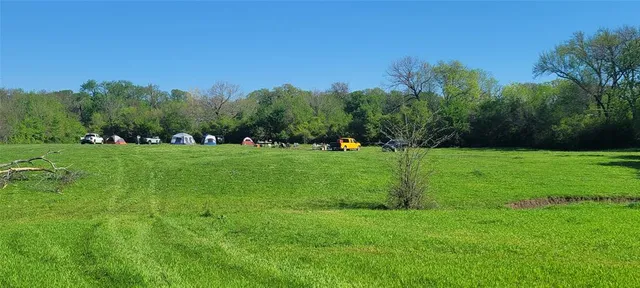 a view of a lake from a yard