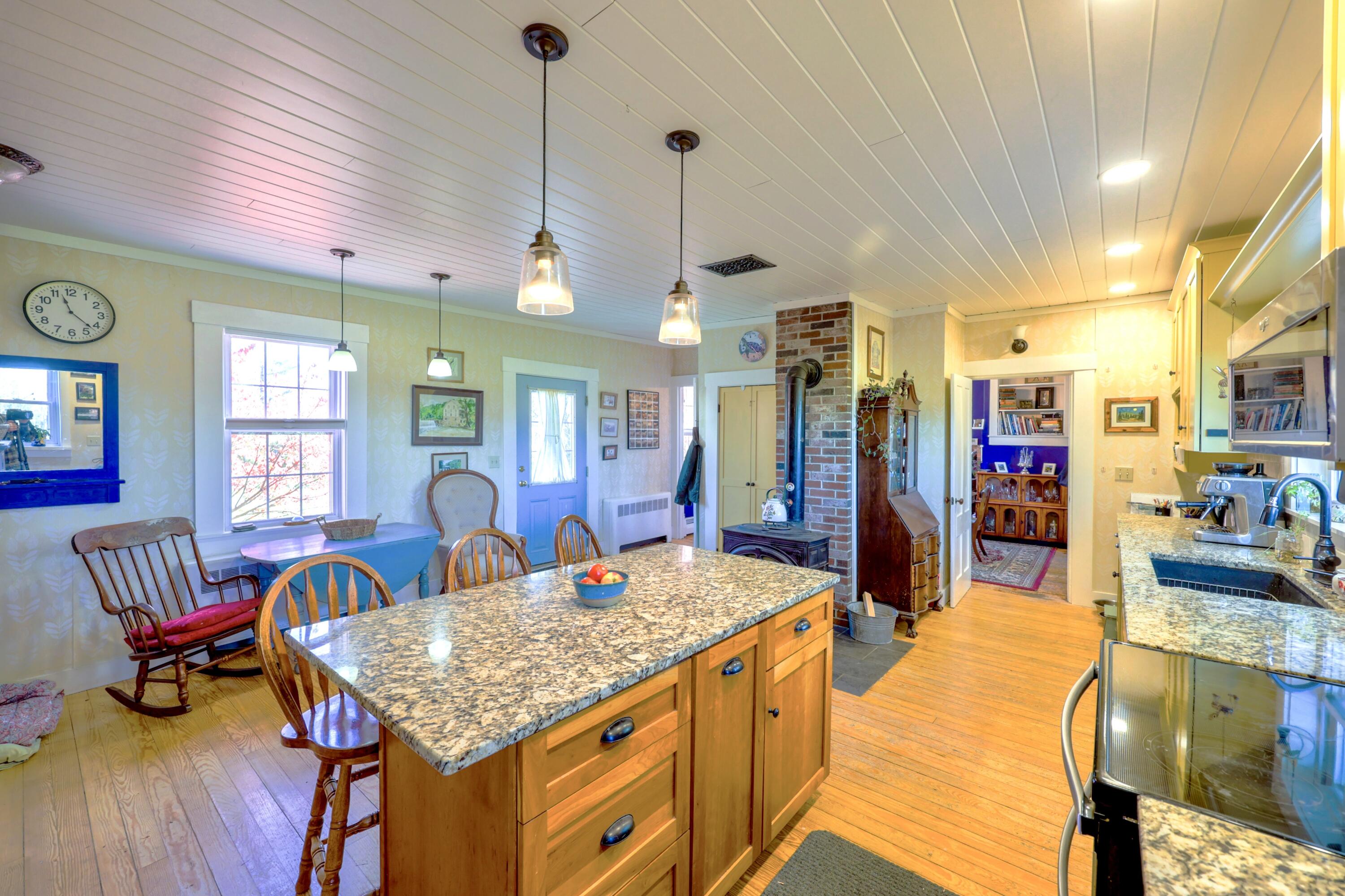 389 Higgins Road Pittsfield, ME 04967 - Photo 16 of 82 Kitchen and main entrance