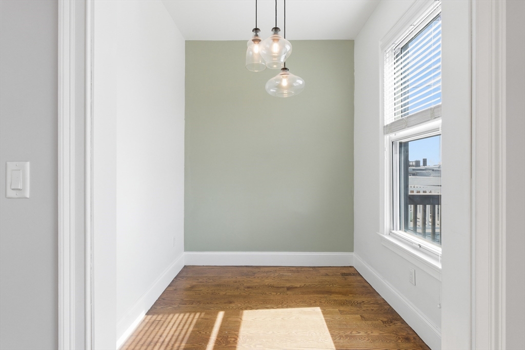 249 Lexington Street, Unit 2 Boston, MA 02128 - Photo 19 of 24 a view of empty room with window