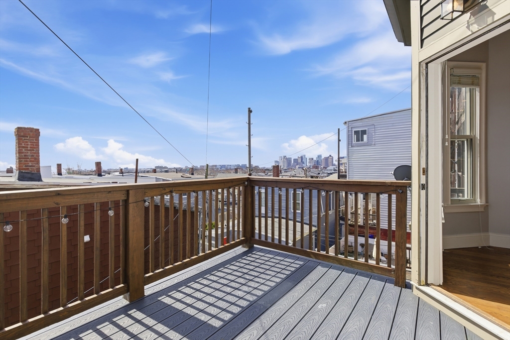 249 Lexington Street, Unit 2 Boston, MA 02128 - Photo 24 of 24 a view of balcony with wooden floor